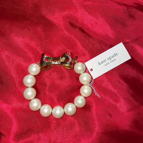 SOLD ON MERCARI!!
NWT-Kate spade gold ‘all wrapped up in pearls’ bow bracelet - Picture 3 of 4